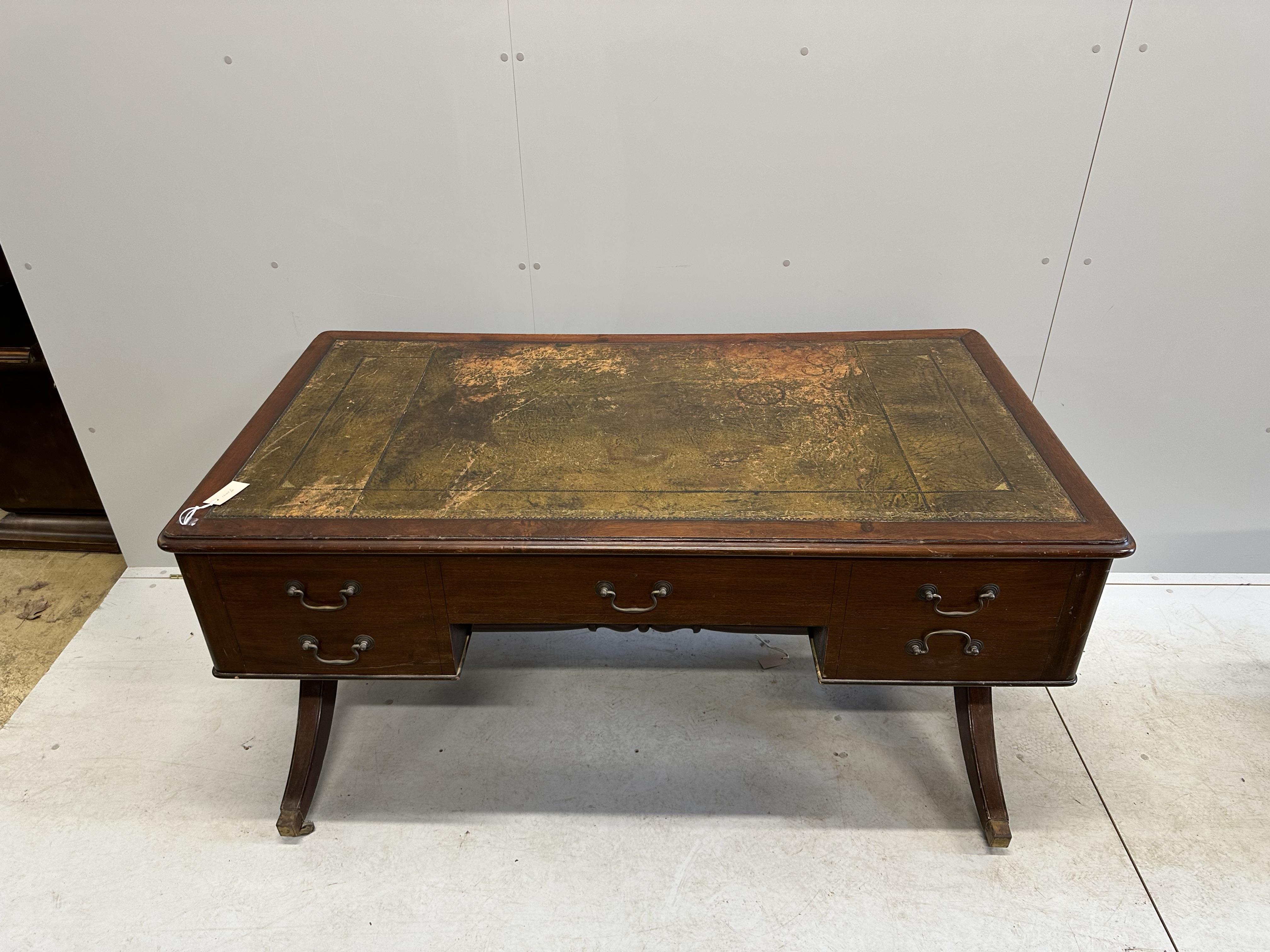 A Victorian mahogany kneehole writing table, width 148cm, depth 80cm, height 77cm